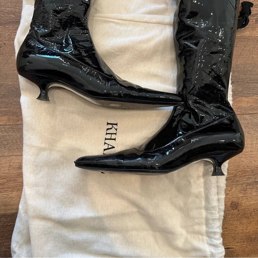 Khaite patent leather knee high boots